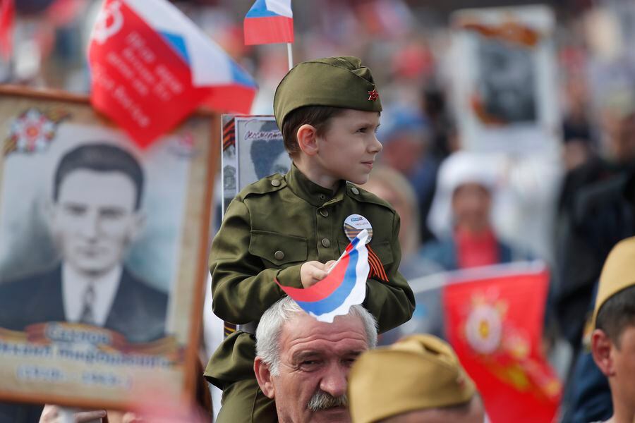 People take part in the Immortal Regiment march during celebrations of the Victory Day in Moscow