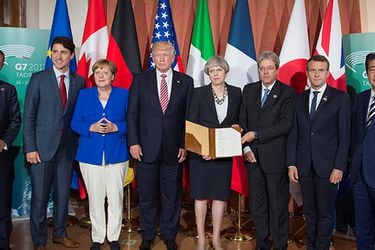 Leaders of the G7 pose after signing the 'G7 Taormina Statement on the Fight Against Terrorism and Violent Extremism' at the G7 summit in Taormina