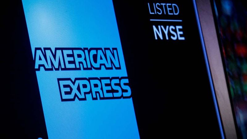 FILE PHOTO: American Express logo and trading symbol are displayed on a screen at the NYSE in New York
