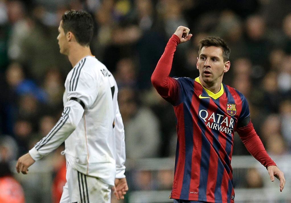Lionel Messi celebra contra el Madrid de Cristiano Ronaldo. Paul White / AP Photo