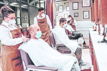 Principal peluquería española para hombres mira a Chile
