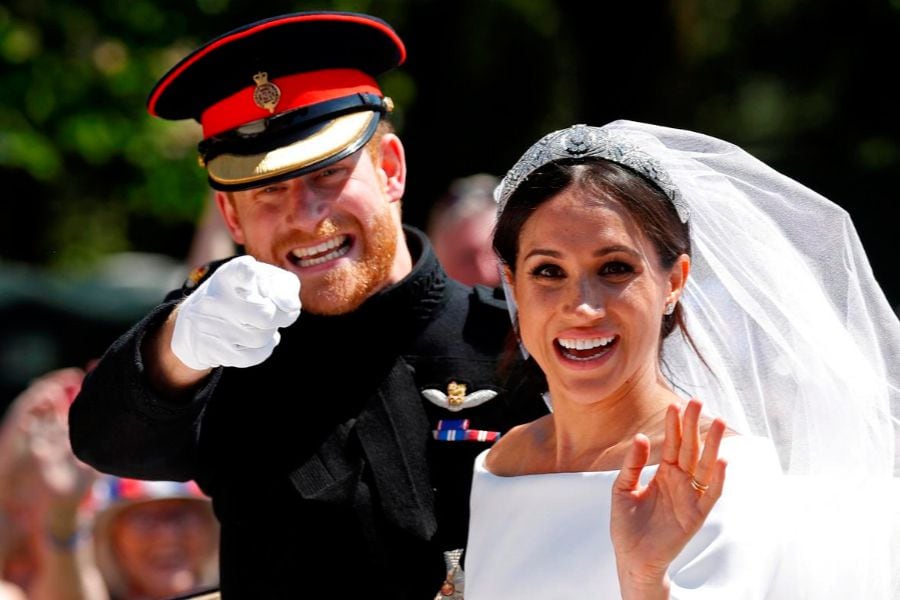 El príncipe Harry junto a su esposa Meghan Markle, después de su boda en la Capilla de San Jorge en el Castillo de Windsor, el 19 de mayo de 2018.