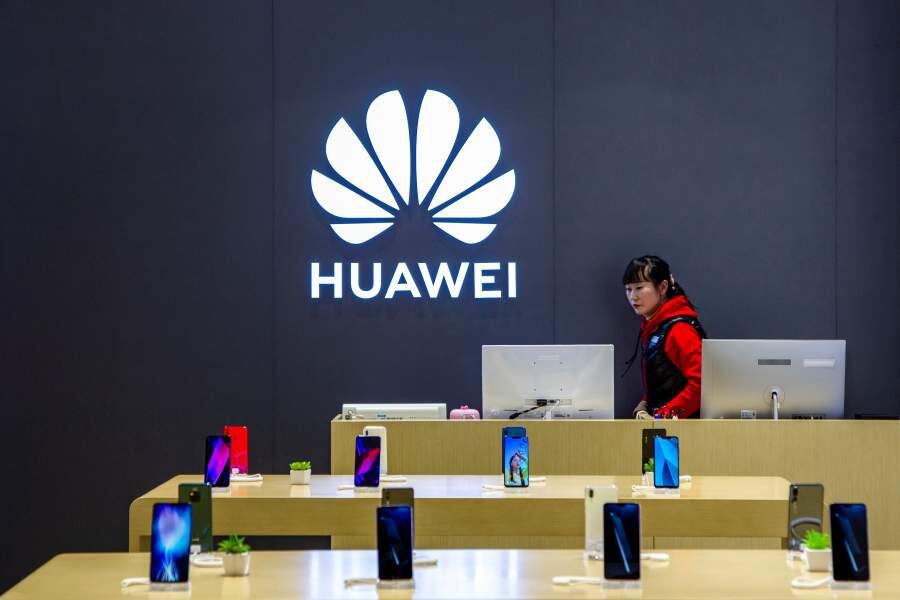 Staff member is seen inside a Huawei retail store in Shanghai