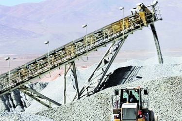 File photo of a bulldozer working in a stockpile of mineral at the Escondida copper mine near Antofagasta