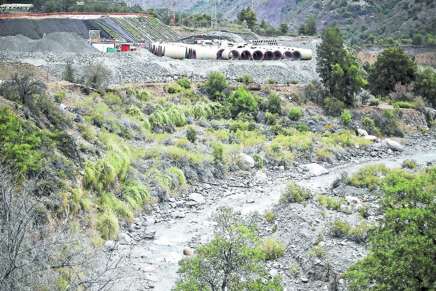 FILE PHOTO: Pipes of Alto Maipo hydroelectric project are seen next to Colorado river, in a pre-mountain range area on the outskirts of Santiago