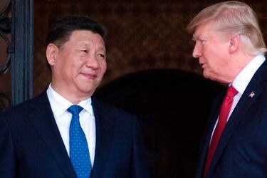 Donald Trump junto al líder chino Xi Jinping