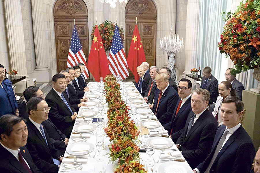 Donald Trump y su par chino, Xi Jinping  en la cumbre del G20.