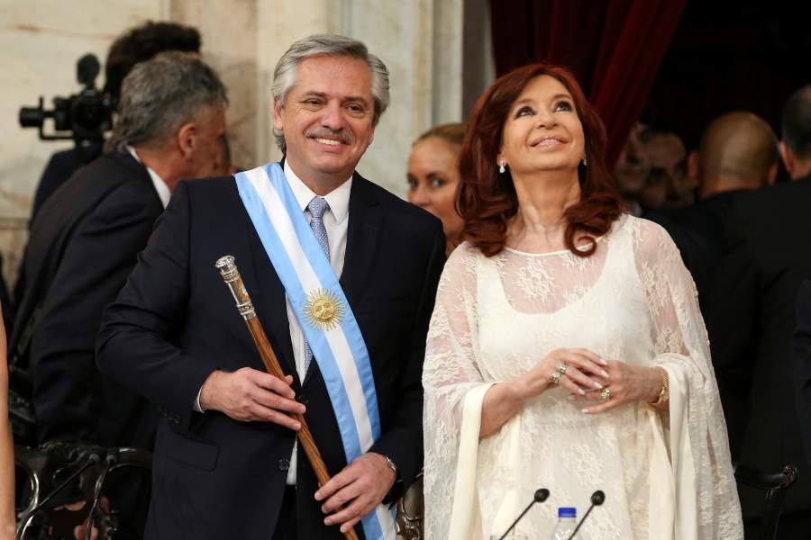 Argentina's President Alberto Fernandez holds the symbolic leader's staff after he was sworn in as Argentina's next president, in Buenos Aires