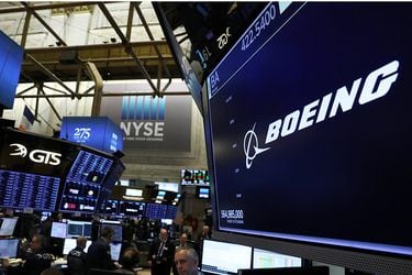 The company logo for Boeing is displayed on a screen on the floor of the NYSE in New York