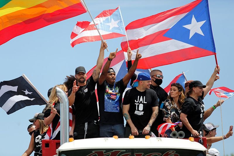Puerto Rican celebrities including Residente, Bad Bunny and Ricky Martin join demonstrators during a protest calling for the resignation of Governor Ricardo Rossello in San Juan