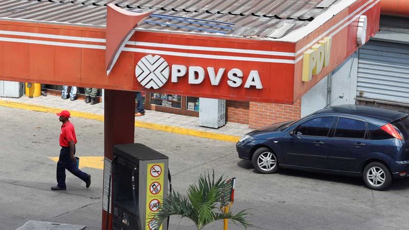 The corporate logo of the state oil company PDVSA is seen at a gas station in Caracas