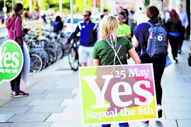 A woman carries a placard as Ireland holds (41800190)