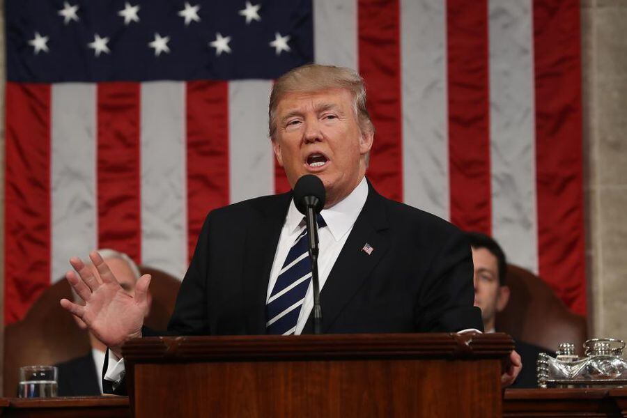 US President Donald J. Trump arrives to delivers his first address to a joint session of Congress from the floor of the House of Representatives in Washington