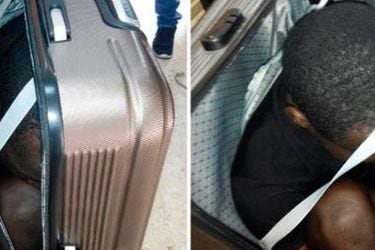 inmigrante en una maleta