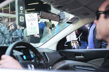 Rideshare drivers in US cities stage a series of strikes and protests, casting a shadow over Uber's Wall St debut