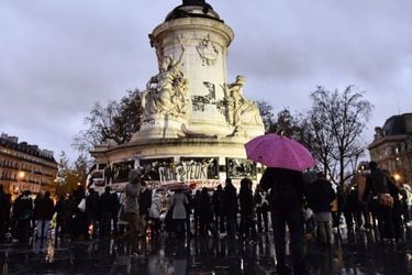 People gather at Place de la Republique (Republic Square) in Paris on