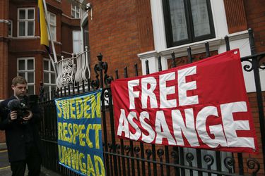 Banners outside the Ecuadorian embassy in London, Monday, Nov.
