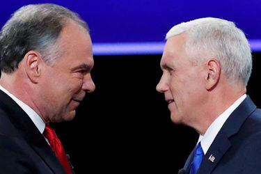 Democratic U.S. vice presidential nominee Senator Tim Kaine and Republican U.S. vice presidential nominee Governor Mike Pence shake hands as they arrive for their vice presidential debate at Longwood University in Farmville