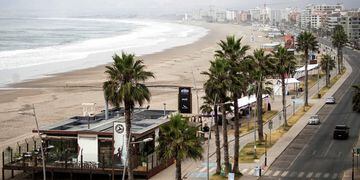 People evacuate the coastline in Chile after a tsunami preventive advisory generated by local authorities, in La Serena