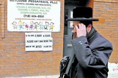FILE PHOTO_ A sign warning people of measles in the ultra-Orthodox Jewish community of Williamsburg (45264636)