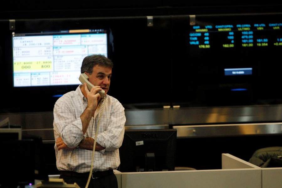 A trader works on the floor of Buenos Aires Stock  Exchange