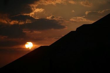 The sun rises behind the Pyramid of the Sun during the spring equinox in the pre-hispanic city of Teotihuacan on the outskirts of Mexico City