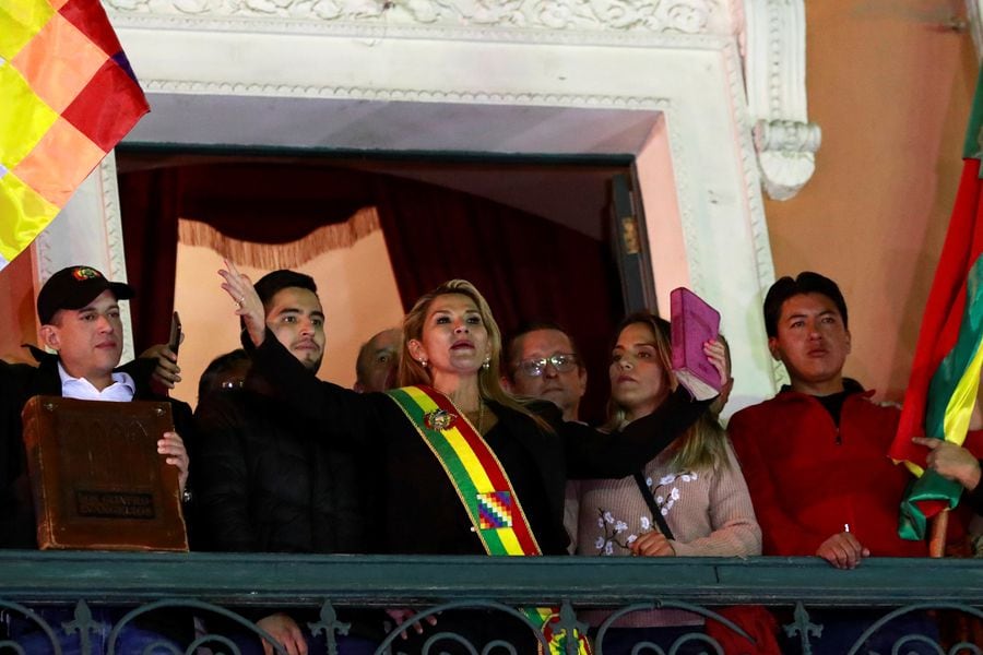 Bolivian Senator Jeanine Anez gestures after she declared herself as Interim President of Bolivia, at the balcony of the Presidential Palace, in La Paz