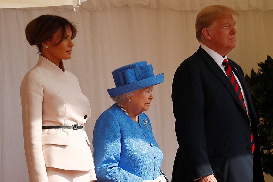 U.S. President Donald Trump and the First Lady Melania Trump are met by Britain's Queen Elizabeth as they arrive for tea at Windsor Castle in Windsor