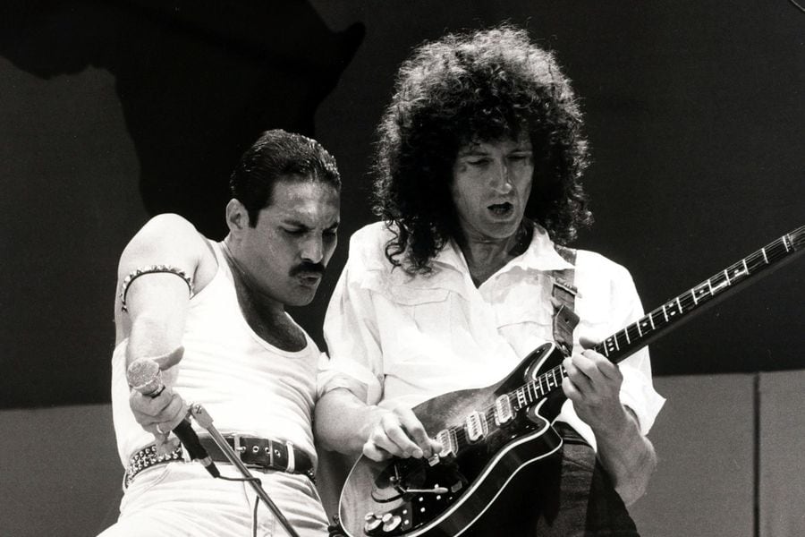 Entertainment/Music. Live Aid Concert. Wembley, London, England. 13th July 1985. British singer Freddie Mercury with guitarist Brian May as "Queen" perform at the charity concert.