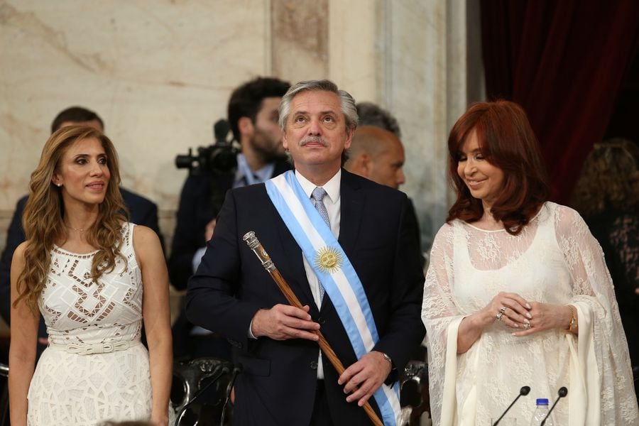 Argentina's President Alberto Fernandez holds the symbolic leader's staff after he was sworn in as Argentina's next president, in Buenos Aires