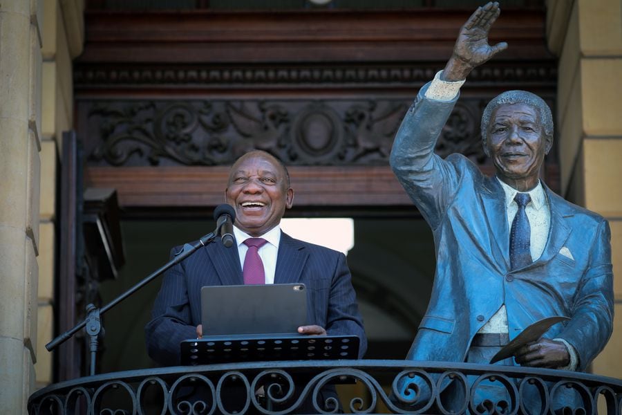 South Africa's President Cyril Ramaphosa speaks from the balcony where Nelson Mandela gave his first speech after his release from prison 30 years ago, in Cape Town