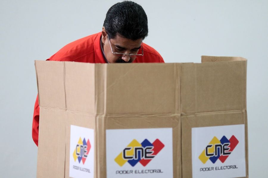 Venezuelan President Nicolas Maduro casts his vote during the Constituent Assembly election in Caracas