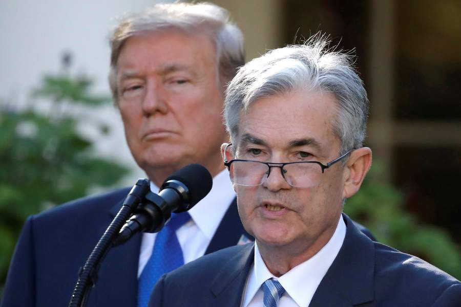 FILE PHOTO: U.S. President Donald Trump looks on as Jerome Powell, his nominee to become chairman of the U.S. Federal Reserve, speaks at the White House in Washington
