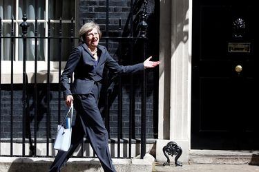 FILE PHOTO: Britain's Home Secretary Theresa May leaves after a cabinet meeting at number 10 Downing Street in London