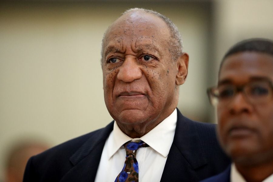 Actor and comedian Bill Cosby returns to the courtroom after a break with his spokesman Andrew Wyatt at the Montgomery County Courthouse