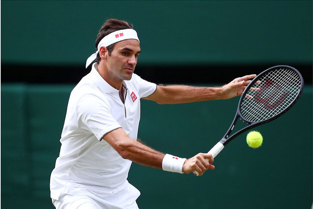 Tennis - Wimbledon - All England Lawn Tennis and Croquet Club, London, Britain - July 12, 2019  Switzerland's Roger Federer in action during his semi-final match against Spain's Rafael Nadal  REUTERS/Hannah McKay