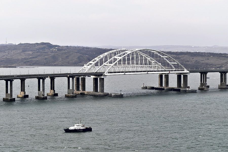 An-aerial-view-shows-a-road-and-rail-bridge,-which-was-constructed-to-connect-the-Russian-mainland-with-the-Crimean-peninsula,-in-the-Kerch-Strait-(47634697)