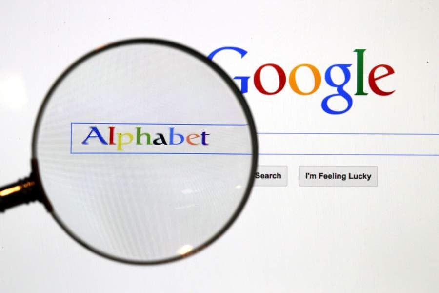 FILE PHOTO: A Google search page is seen through a magnifying glass in this photo illustration taken in Berlin