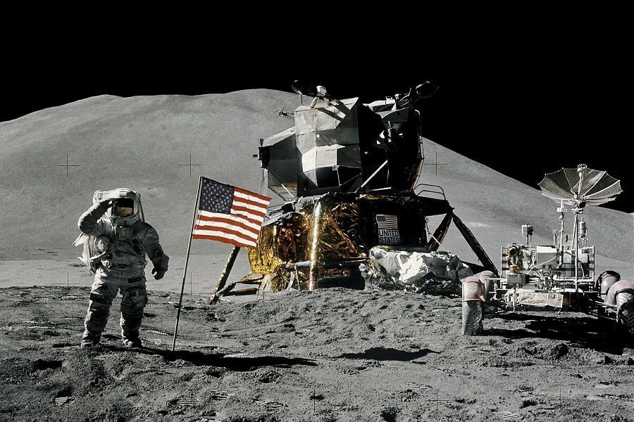 FILE PHOTO: Astronaut James Irwin gives a military salute while standing beside the U.S. flag during the Apollo 15 mission on the moon