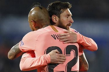 Arturo Vidal y Lionel Messi