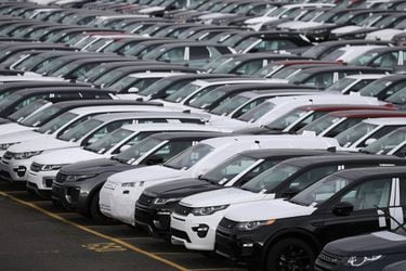 New Land Rover cars are seen in a parking lot at the Jaguar Land Rover plant at Halewood in Liverpool, northern England.