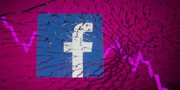 FILE PHOTO: Facebook logo and stock graph are displayed through broken glass in this illustration