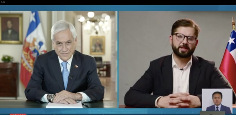 El momento de la comunicación entre el presidente en ejercicio, Sebastián Piñera, y el recién electo Gabriel Boric. Foto: Agencia Uno.