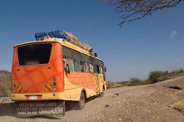 bus-on-dirt-road-tanzania-africa-e1450740843257