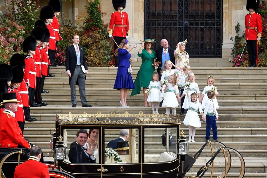 Britain's Princess Eugenie of York and her husband Jack Brooksbank leave in a carriage after their wedding ceremony at Windsor Castle, Windsor