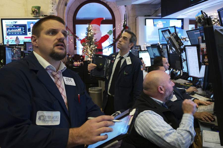 Traders with Livermore Securities at the New York Stock Exchange foll