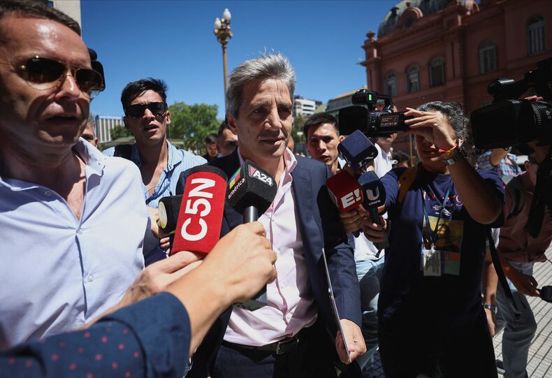 Argentina's Economy Minister Luis Caputo leaves the Casa Rosada Presidential Palace