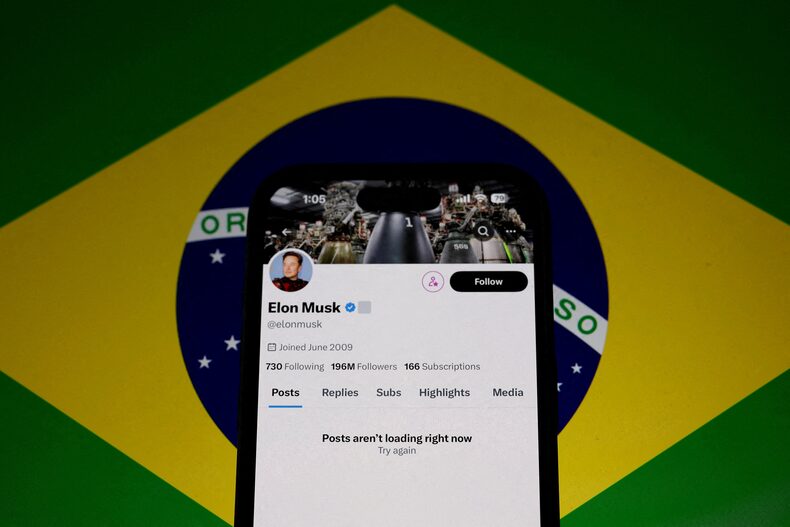 FILE PHOTO: Elon Musk's X account is seen blocked on a mobile screen in this illustration after Brazil suspended telecommunications regulations