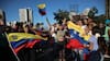 Venezolanos se manifiestan en el mundo tras captura de Nicolás Maduro, mientras chavistas protestan en Caracas