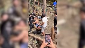 Intensas lluvias retrasan la búsqueda de las otras dos personas atrapadas en una cueva en Laos